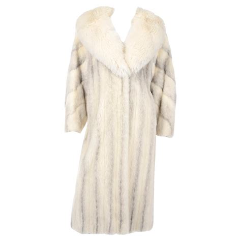 fur dior|Dior ivory fur coat.